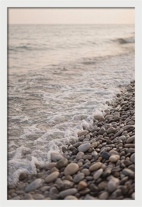 Gentle Waves Lapping On Pebble Beach