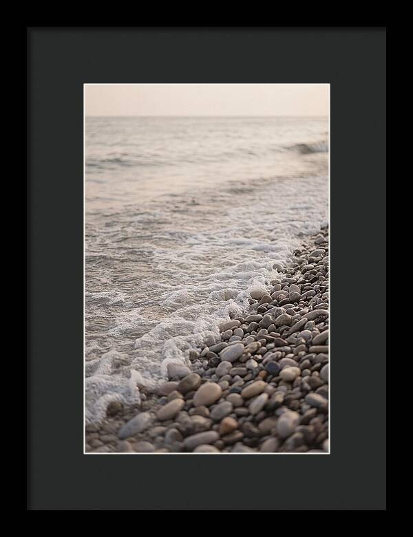 Gentle Waves Lapping On Pebble Beach