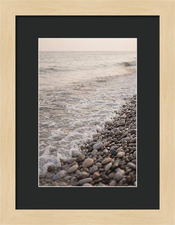 Gentle Waves Lapping On Pebble Beach