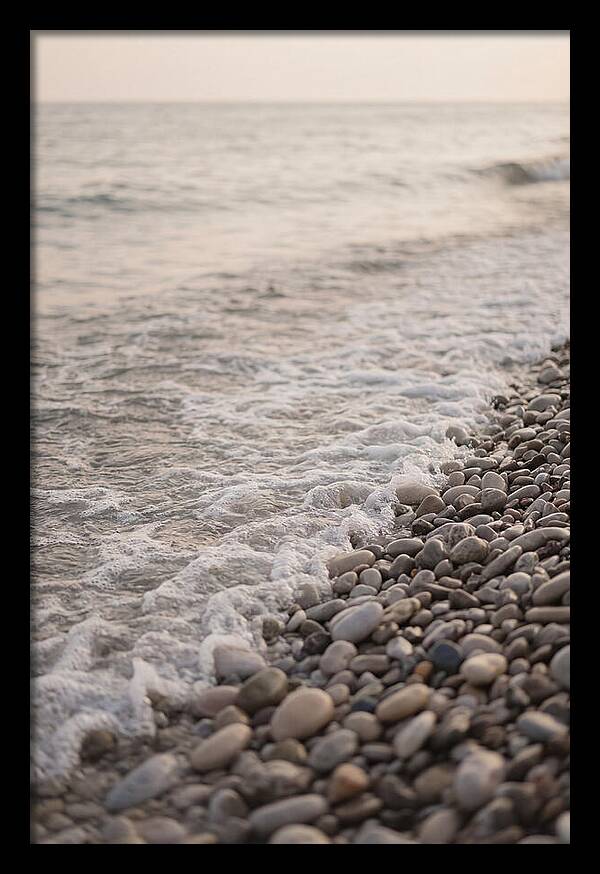 Gentle Waves Lapping On Pebble Beach