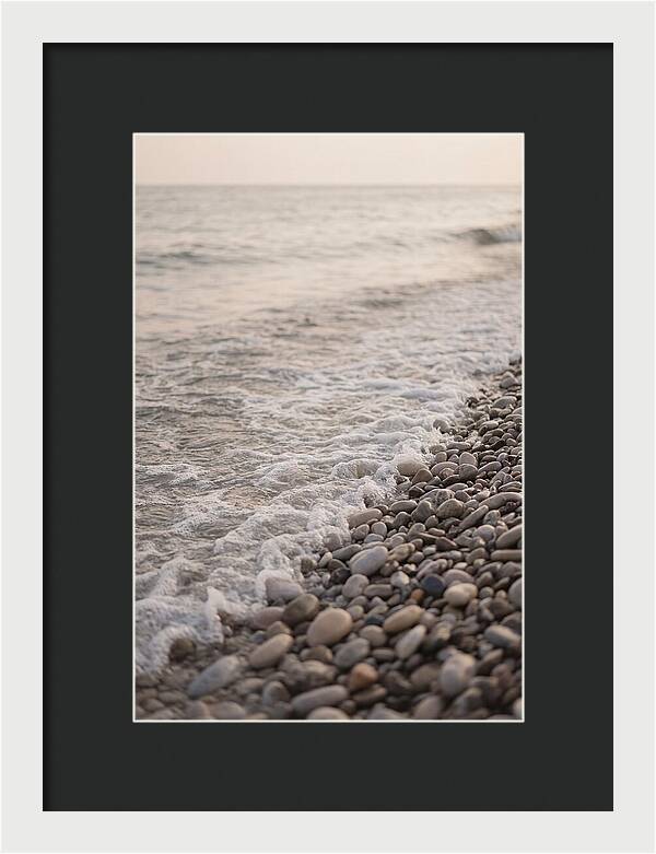 Gentle Waves Lapping On Pebble Beach
