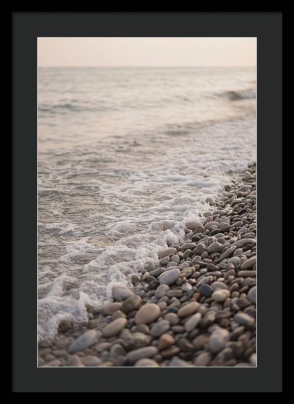 Gentle Waves Lapping On Pebble Beach