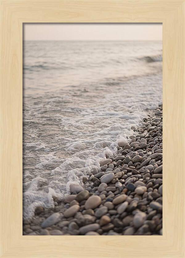 Gentle Waves Lapping On Pebble Beach