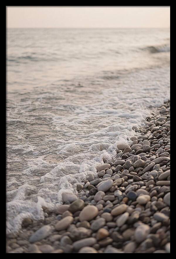 Gentle Waves Lapping On Pebble Beach