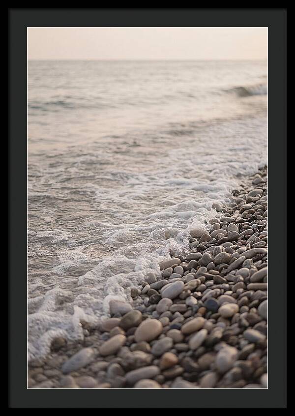 Gentle Waves Lapping On Pebble Beach