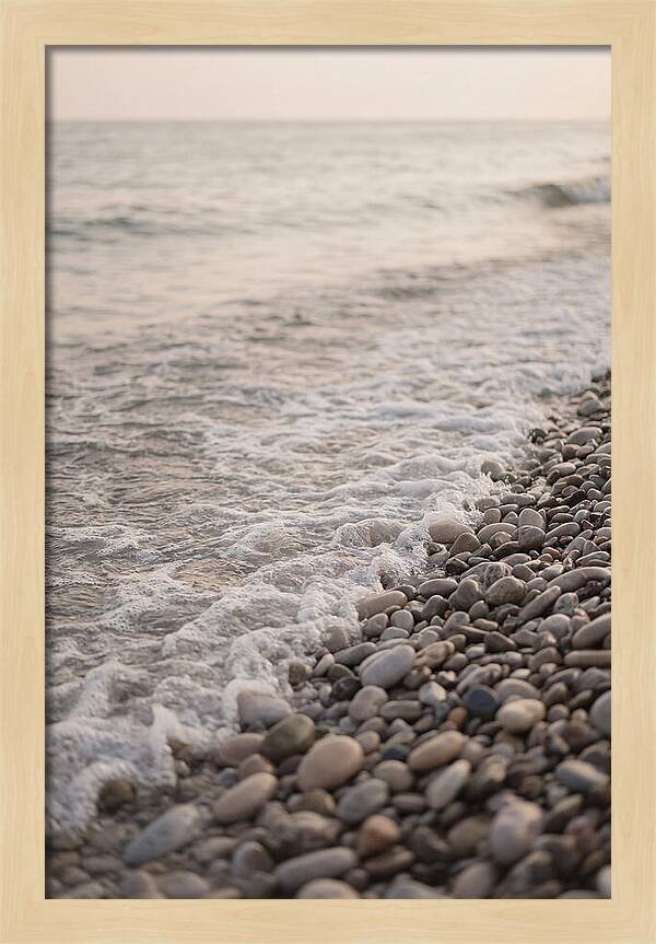 Gentle Waves Lapping On Pebble Beach