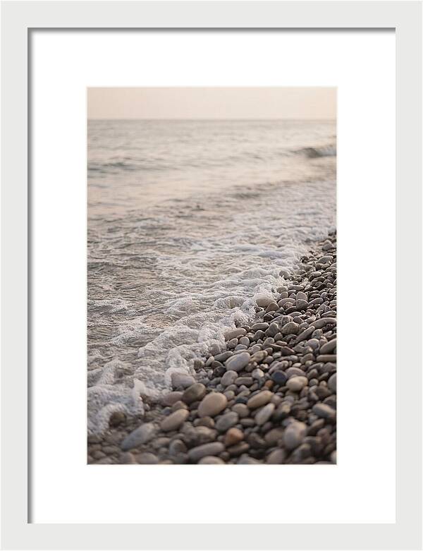 Gentle Waves Lapping On Pebble Beach