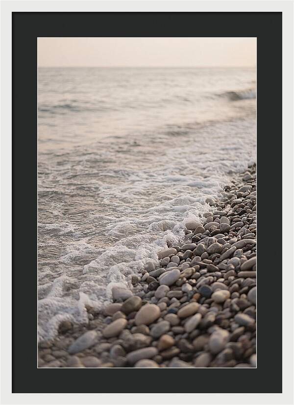 Gentle Waves Lapping On Pebble Beach