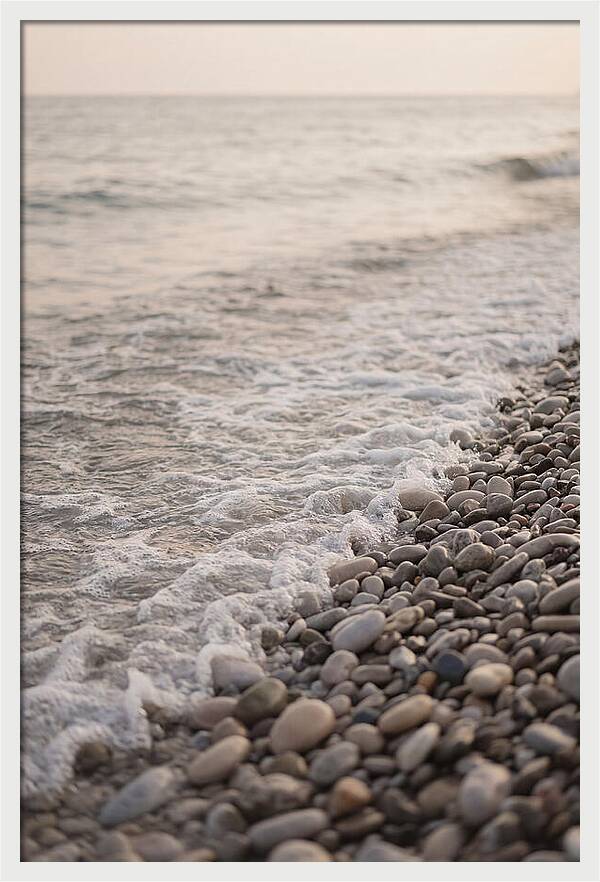 Gentle Waves Lapping On Pebble Beach