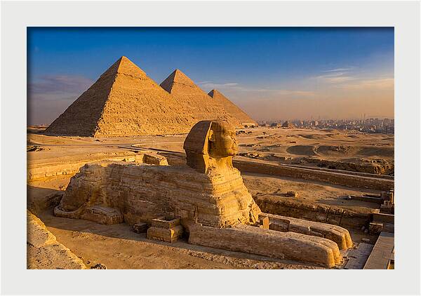 Giza Pyramids And Sphinx At Golden Hour