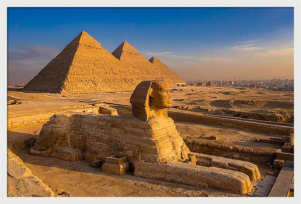 Giza Pyramids And Sphinx At Golden Hour