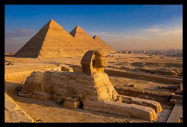 Giza Pyramids And Sphinx At Golden Hour