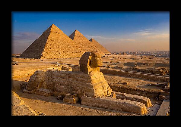 Giza Pyramids And Sphinx At Golden Hour