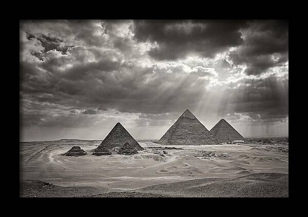Giza Pyramids Under Dramatic Skies