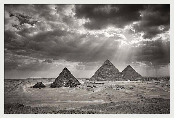 Giza Pyramids Under Dramatic Skies