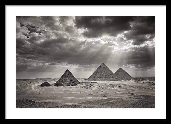 Giza Pyramids Under Dramatic Skies