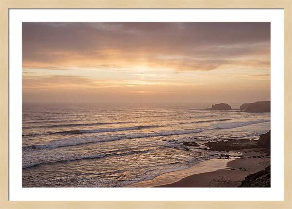 Golden Sunrise Over Calm Ocean