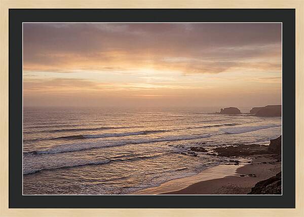 Golden Sunrise Over Calm Ocean