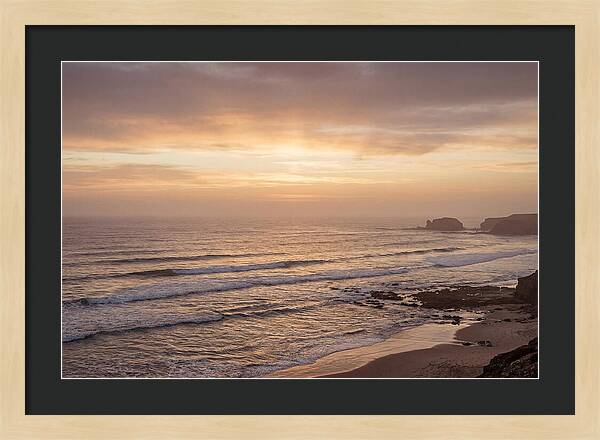 Golden Sunrise Over Calm Ocean