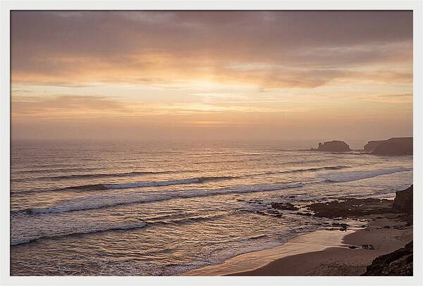 Golden Sunrise Over Calm Ocean