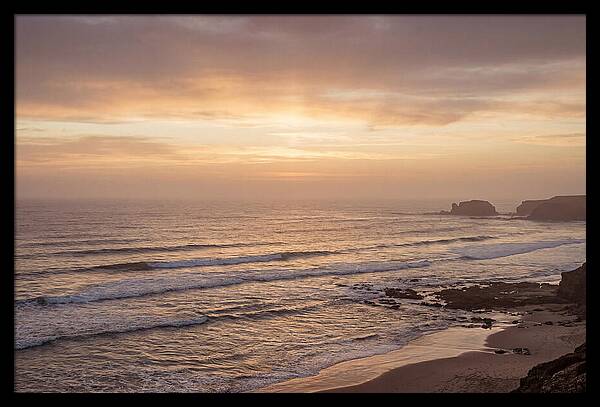 Golden Sunrise Over Calm Ocean