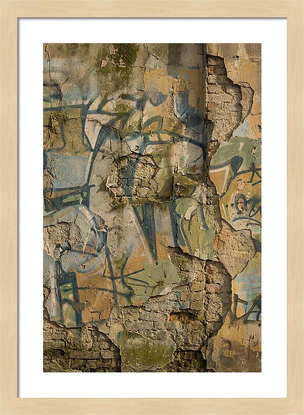 Graffiti On Weathered Wall