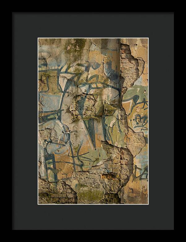 Graffiti On Weathered Wall