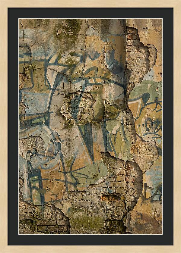Graffiti On Weathered Wall