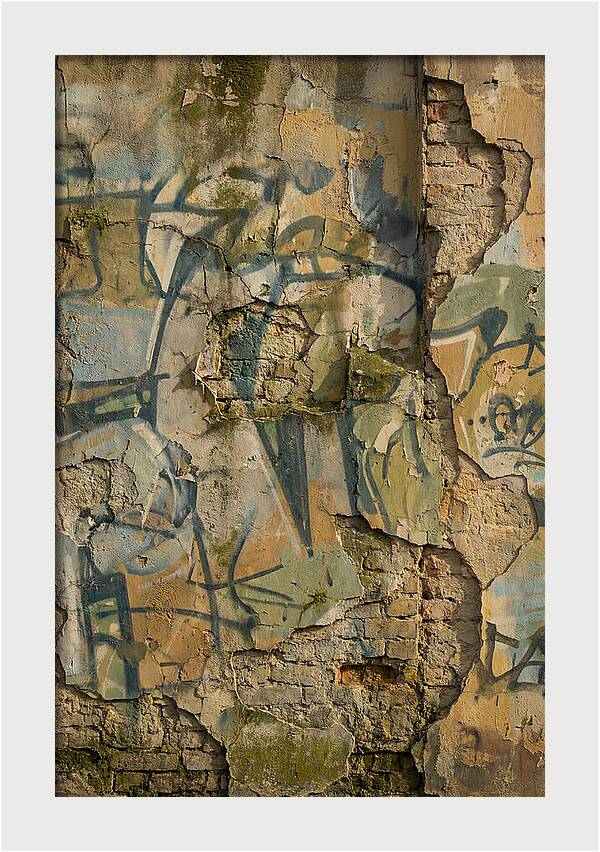 Graffiti On Weathered Wall