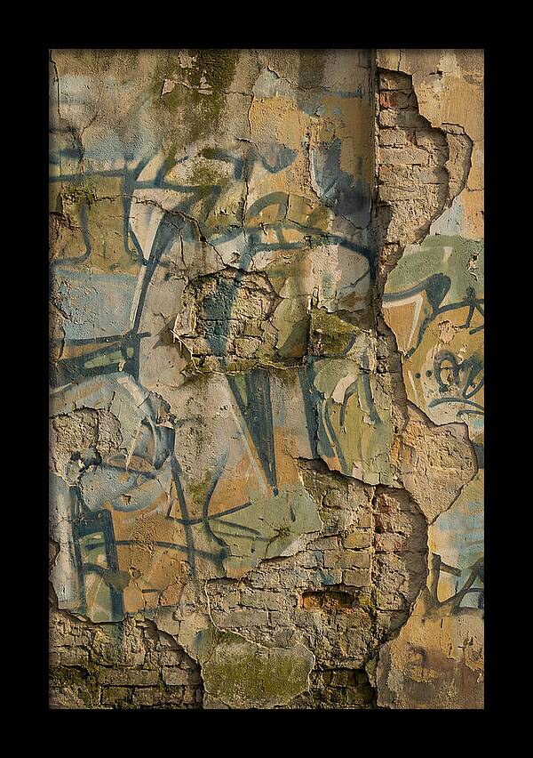 Graffiti On Weathered Wall