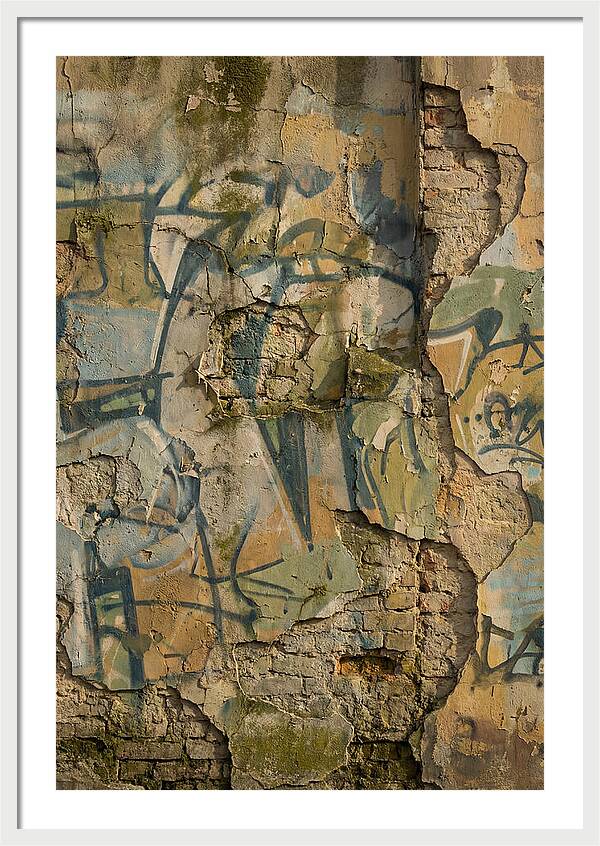Graffiti On Weathered Wall