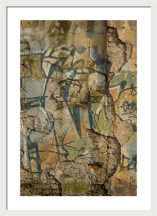 Graffiti On Weathered Wall