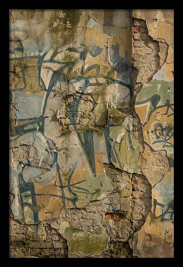 Graffiti On Weathered Wall