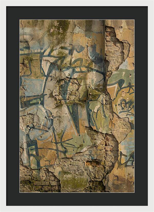 Graffiti On Weathered Wall