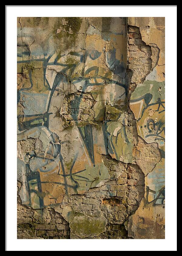 Graffiti On Weathered Wall