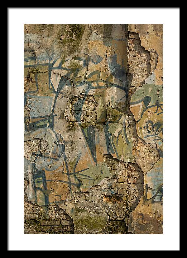 Graffiti On Weathered Wall
