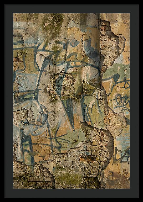 Graffiti On Weathered Wall