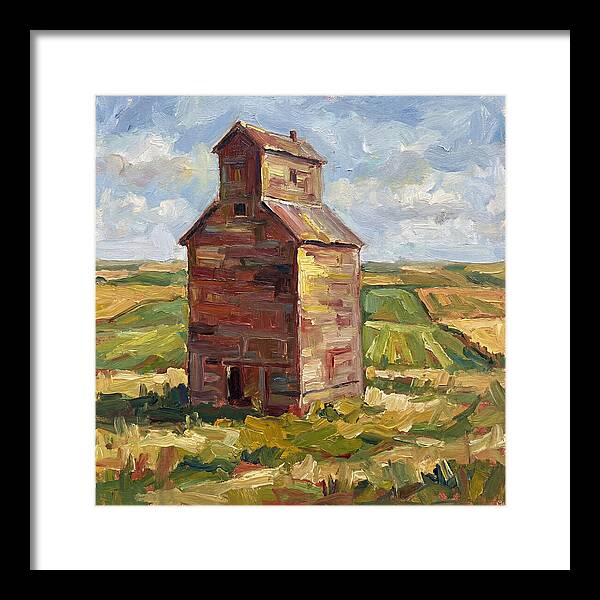 Grain Silo Under Blue Skies