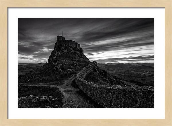 Hilltop Castle Silhouetted Against Sunset