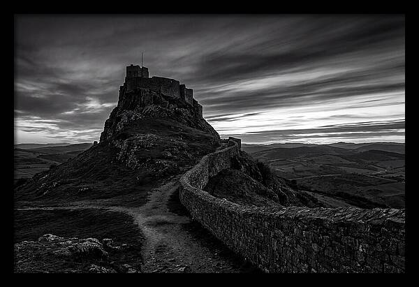 Hilltop Castle Silhouetted Against Sunset