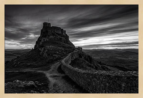 Hilltop Castle Silhouetted Against Sunset
