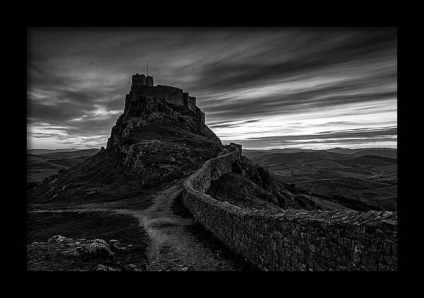 Hilltop Castle Silhouetted Against Sunset