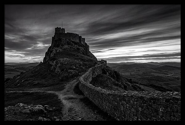 Hilltop Castle Silhouetted Against Sunset