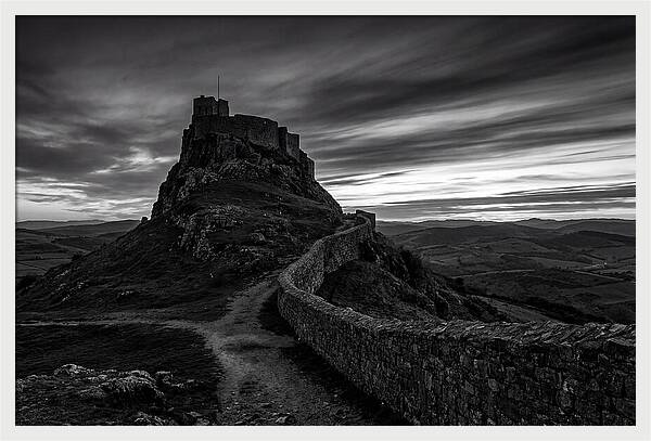 Hilltop Castle Silhouetted Against Sunset