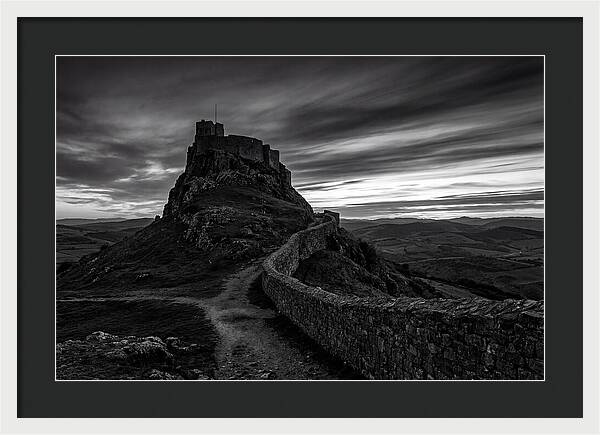 Hilltop Castle Silhouetted Against Sunset