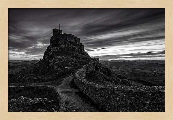 Hilltop Castle Silhouetted Against Sunset