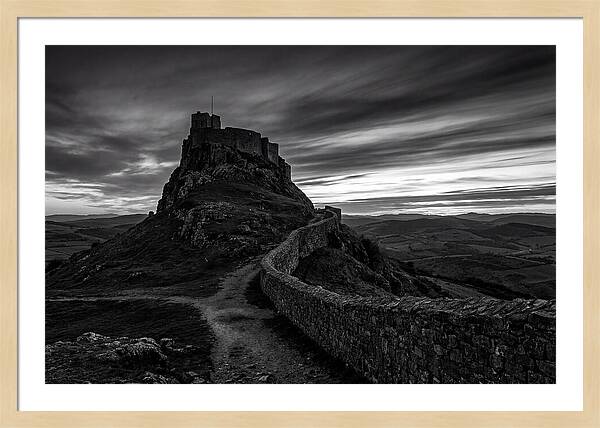 Hilltop Castle Silhouetted Against Sunset