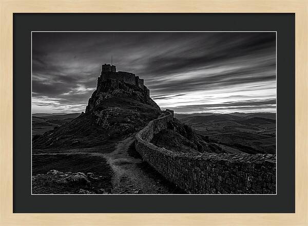 Hilltop Castle Silhouetted Against Sunset