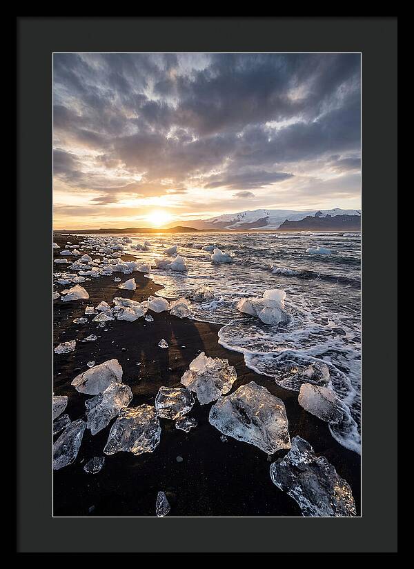 Icebergs At Sunset On Black Sand