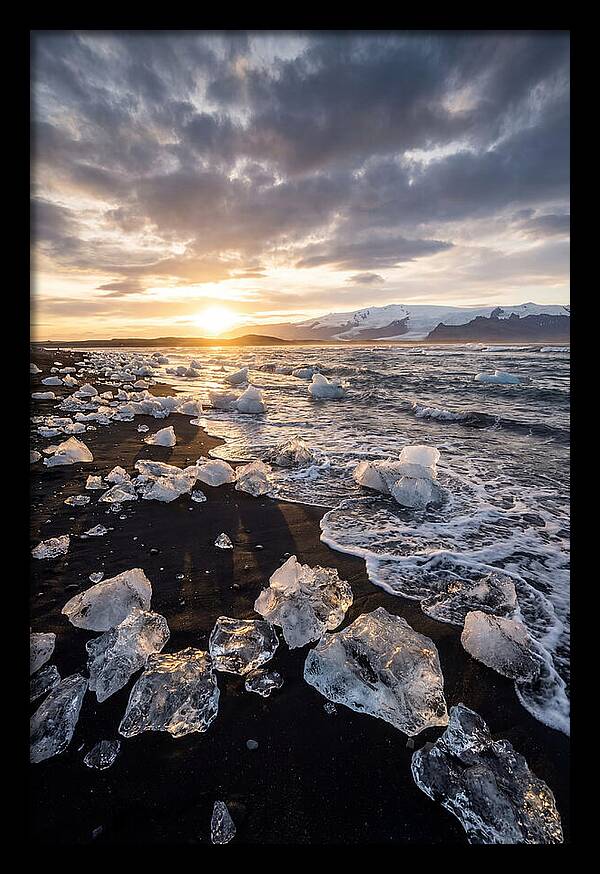 Icebergs At Sunset On Black Sand